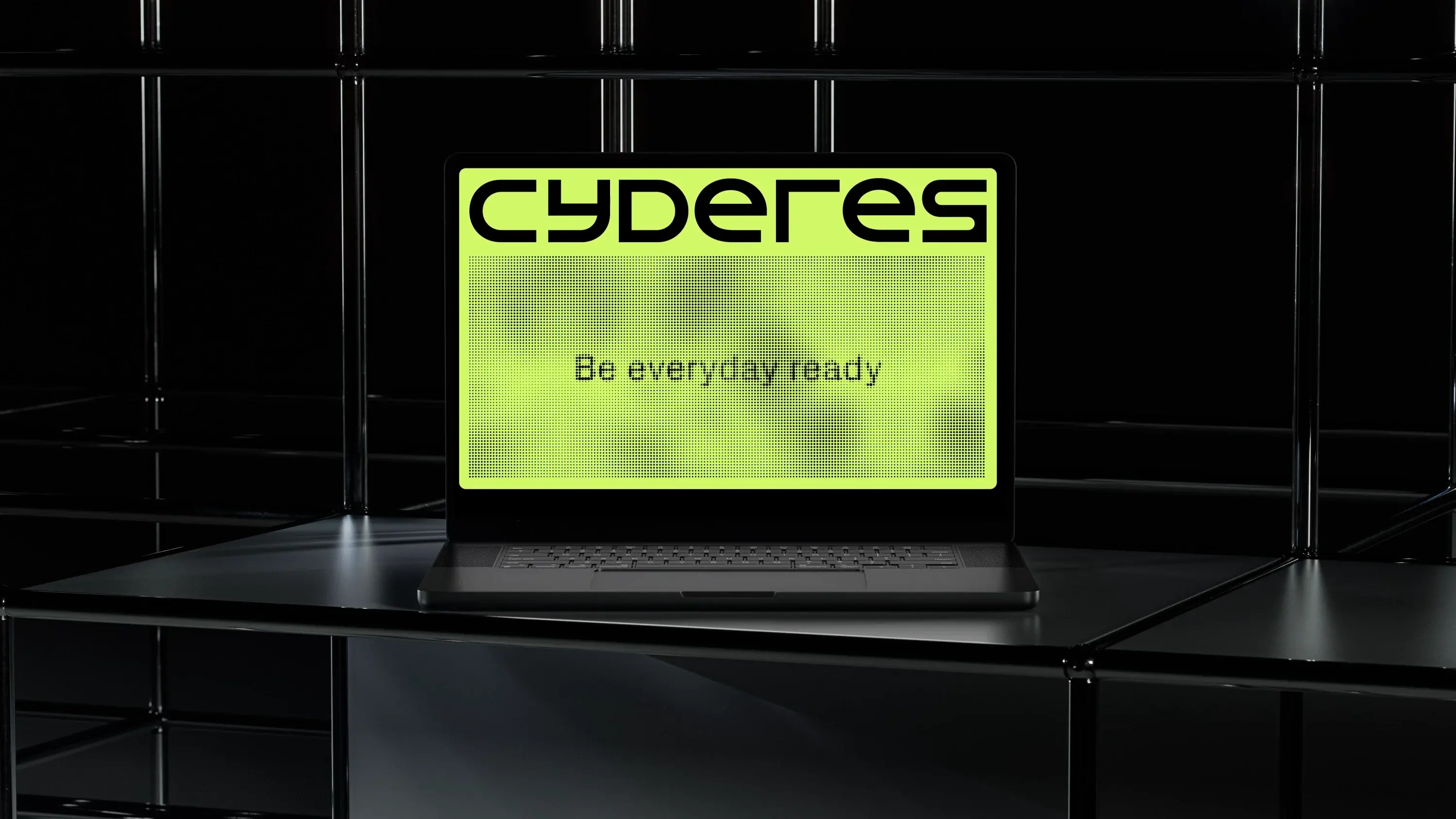A laptop displaying the Cyderes logo and the phrase 